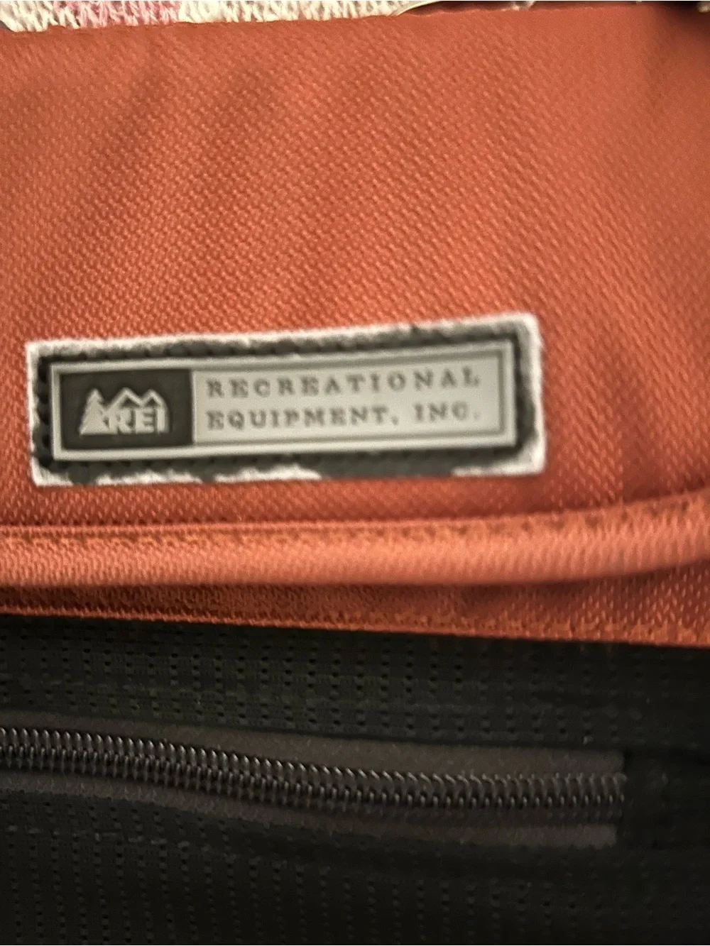 REI Men's Rust and Black Messenger Laptop Bag with Adjustable Strap. Padded